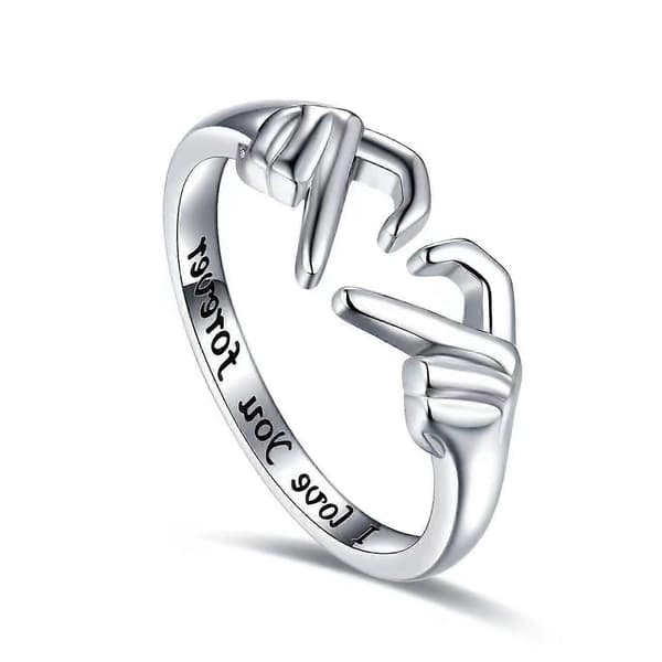 Hjerteformet ring - et pars ring, der symboliserer kærlighed og omfavnelse.