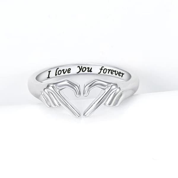 Hjerteformet ring - et pars ring, der symboliserer kærlighed og omfavnelse.