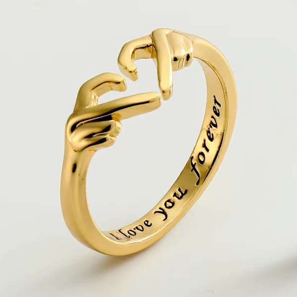 Hjerteformet ring - et pars ring, der symboliserer kærlighed og omfavnelse.