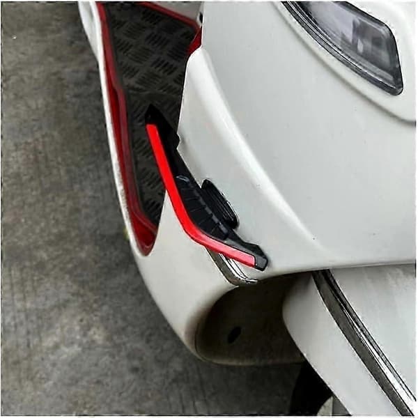 Spoilerwinglets (ett par motorcykelwinglets), sidokåpswinglets, aerodynamiska spoilers, röda