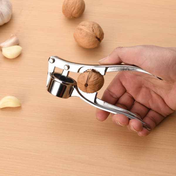Kraftig hvidløgspresser i rustfrit stål, multifunktionel hvidløgspresser, skræller og juicer.