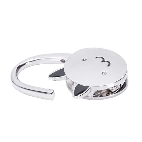 Vikbar handväskkrok med kattmotiv i silverfärg, halkfri