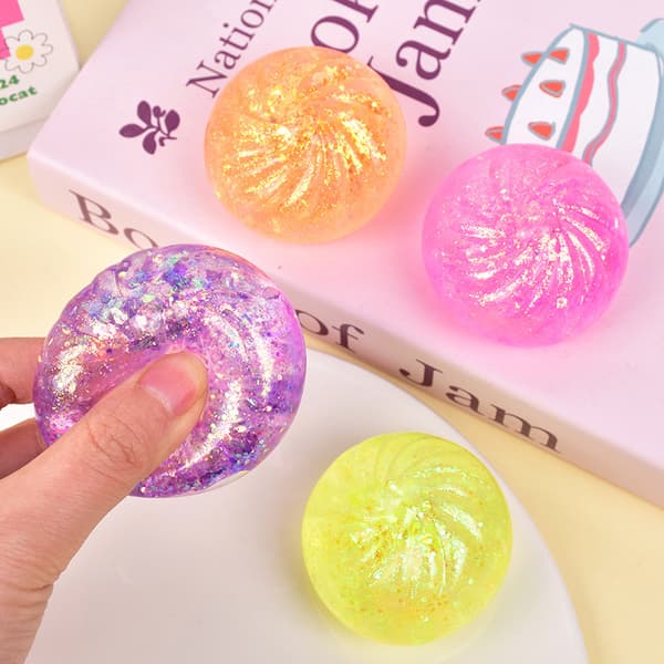 Glitterfärgad bulleformad klämboll för sensorisk handlek Gold Glitter Bun+Steamer Box