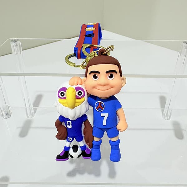 Set med 2 VM-stjärnfigurinyckelringar: Chibi-stil fotbollsstjärneprodukter