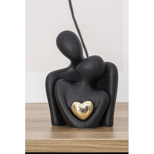 Minimalistisk Par Omfavnende Figur (Sort og Guld) M