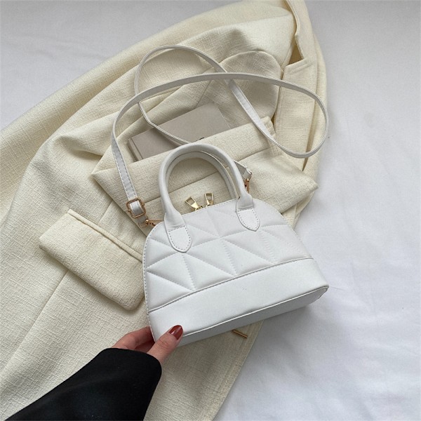 Fashion Populär Shell Bag 2023 Vår Ny Enkel Casual Hand Holding Kvinnors Väska Shengshi Trendy One-Shoulder Bage White