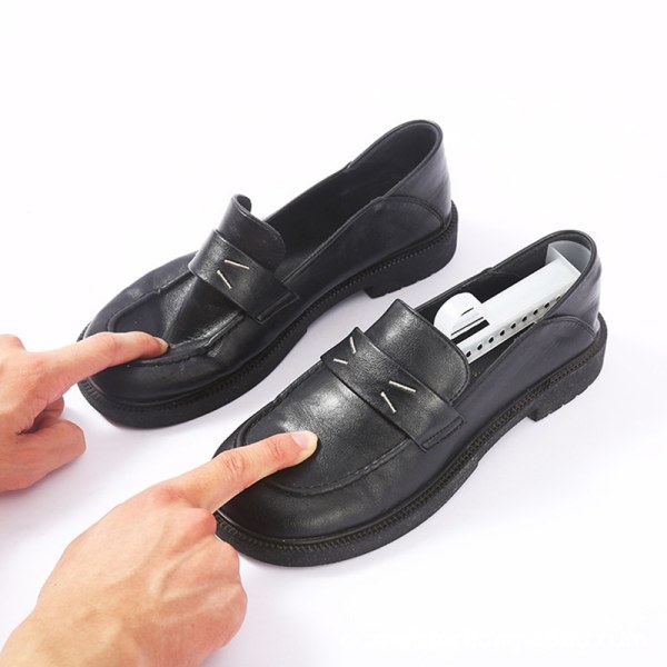 Justerbart skoställ i plast för män Shaping Stretcher Black