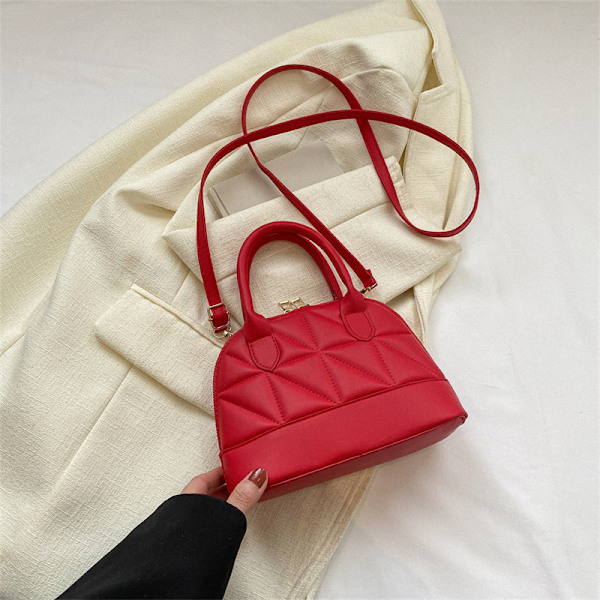 Fashion Populär Shell Bag 2023 Vår Ny Enkel Casual Hand Holding Kvinnors Väska Shengshi Trendy One-Shoulder Bage Röd
