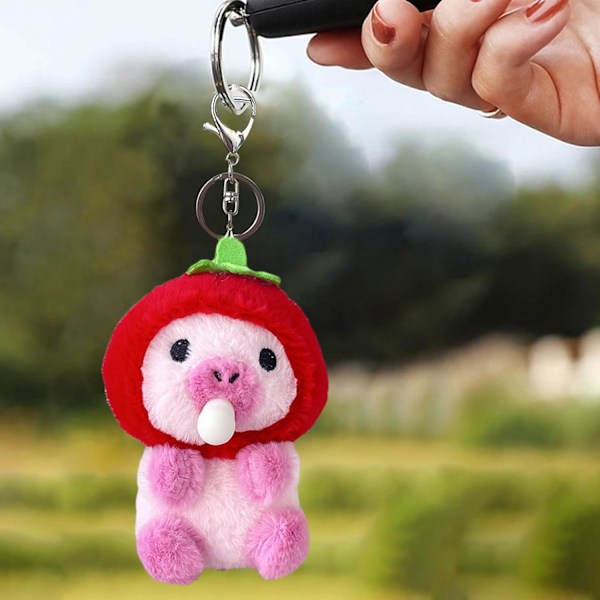 Capybara plysch nyckelring - realistinen 11 cm capybara täytetty lelu, riipus reppuun ja laukkuun Röd jordgubbe