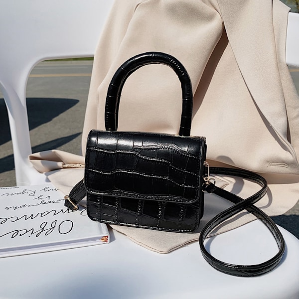 Uusi internet-tähti samassa tyylissä kivikuvioinen olkalaukku naisten käsilaukku korealainen tyyli crossbody flip monipuolinen käsilaukku tote-laukku Keltainen