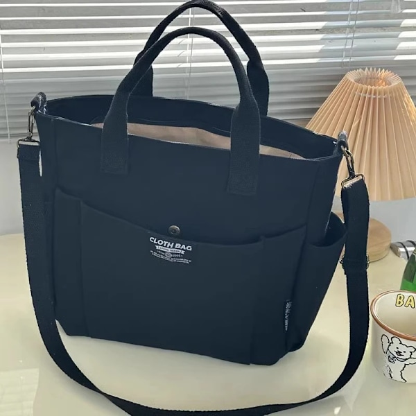 Urban Minimalistisk Kvinnlig Student Stor Kapacitet Pendla Horisontell Canvas Enkel Axel Diagonal Cross Portable Tote Bage Svart