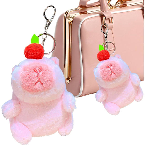 Laulava Capybara plyysiavainperä - luova musiikkipehmolelu riipus, reppukoriste Rosa