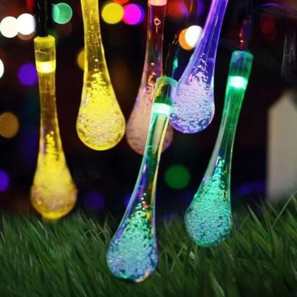Solcelledrevne lyslenker, 50 LED 9,5 M Solar Water Drop Light for utendørs og innendørs, julefester (farge)