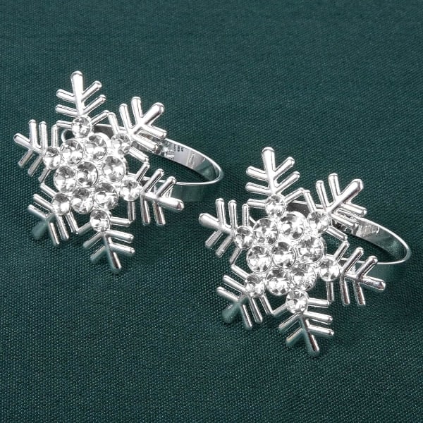 Servettringar - Set med 12 snöflingor i silvermetall för jul