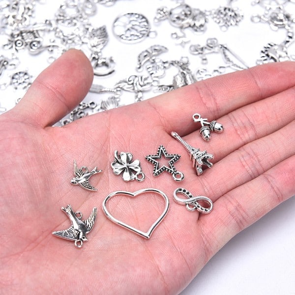 100 kpl Hopeisia Charms Riipuksia DIY-korutarvikkeisiin Hopea