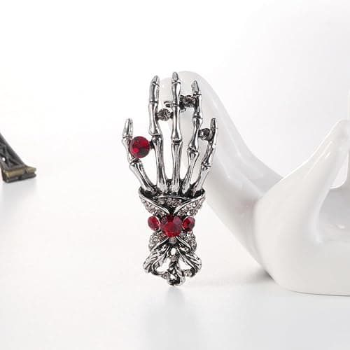 Dödskalleformad handbrosch, punk chic-stil, prydd med strass och tillverkad av legering. Mångsidig accessoar för kläder och väskor. (JYD)
