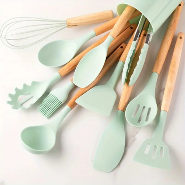 12-deligt set med värmebeständiga silikonköksredskap med trähandtag 12pcs light green