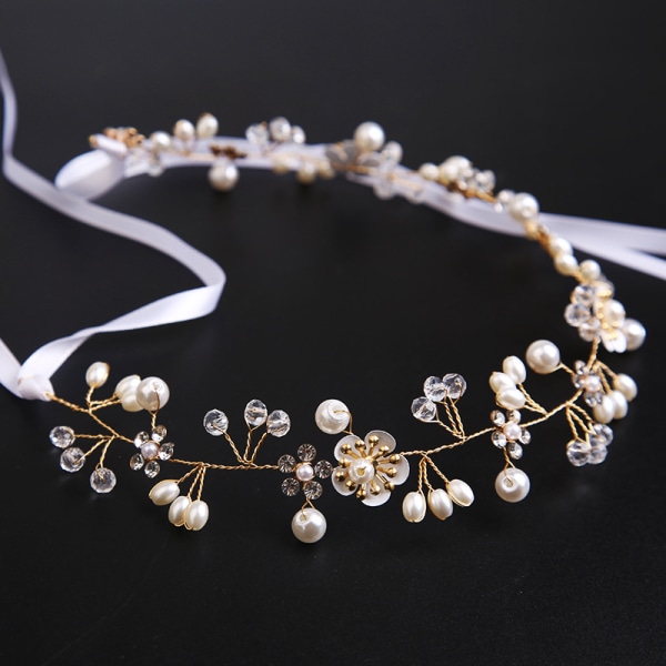 En kvinnelig brud tiara perle show pannebånd bryllup smykker vi