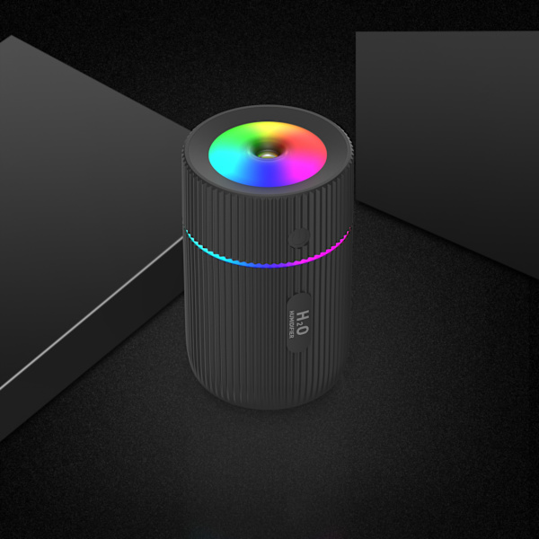 Kostutin värikkäällä LED-lampulla musta