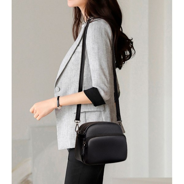 Aito nahkainen Crossbody laukku - tyylikäs ja tilava