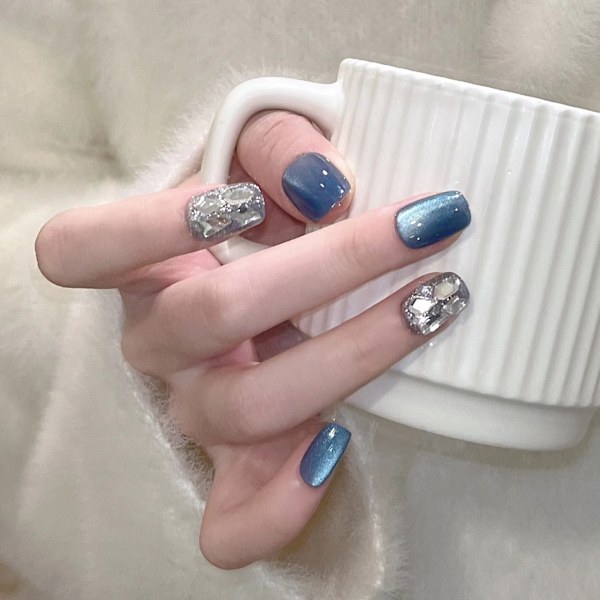 Blå kattögon korta nagellappar med strass - 24 stycken