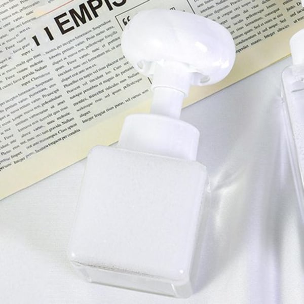 Skummande handtvålsdispenser blomform