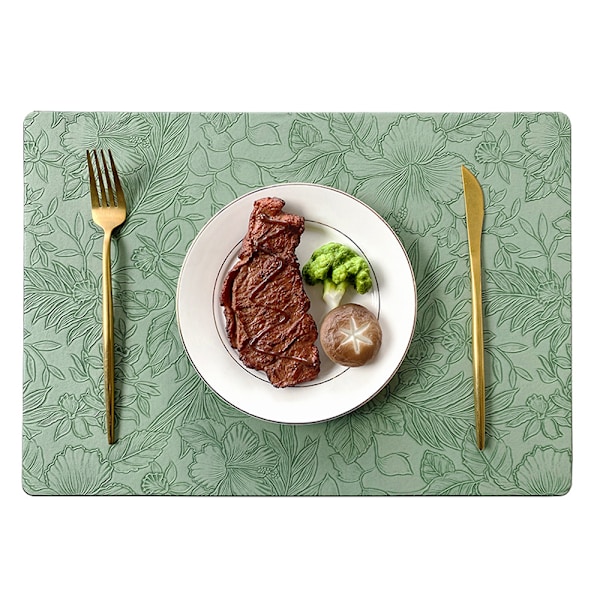 Set med 4 bordstabletter i präglat läder Grön