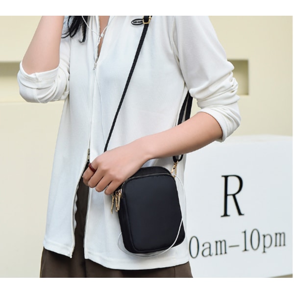 INF Crossbody mobiltaske Sort