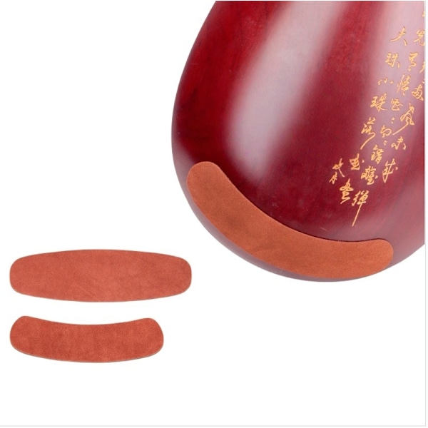 Halvmåneformad Anti-Slip Pad för Pipa Instrument