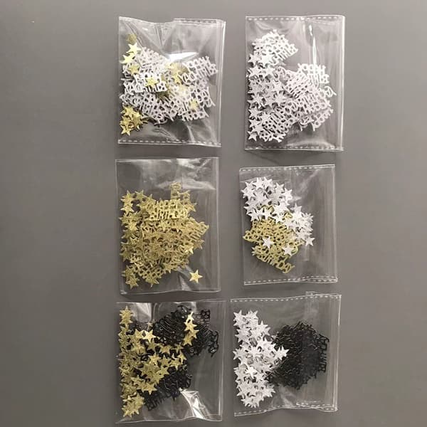 Konfetti, 30 stk. bogstaver & 100 stk. stjerner Black Black