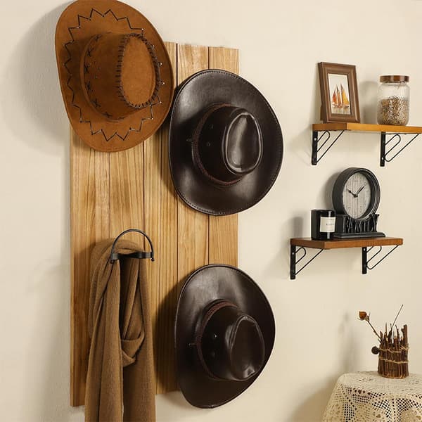 Seinälle kiinnitettävä cowboyhattuteline