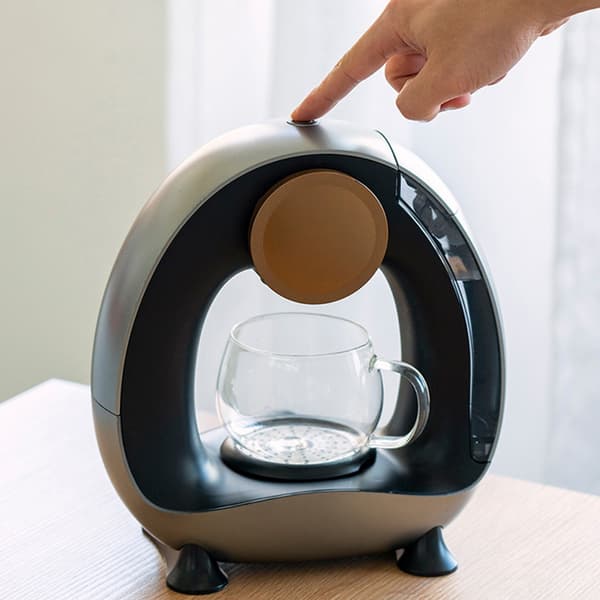miniQ drypkaffemaskine med kapselholder, 85 °C brygning, 20 sekunders opvarmning og 220 v understøttelse Silver Silver