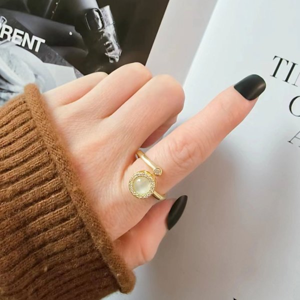 Justerbar åben ring med drejelig rund dekoration Guld
