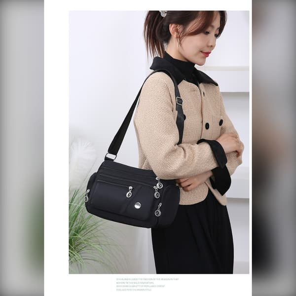 Stilfuld Sort Nylon & Polyester Skuldertaske med Stor Kapacitet, Kompatibel med diverse enheder