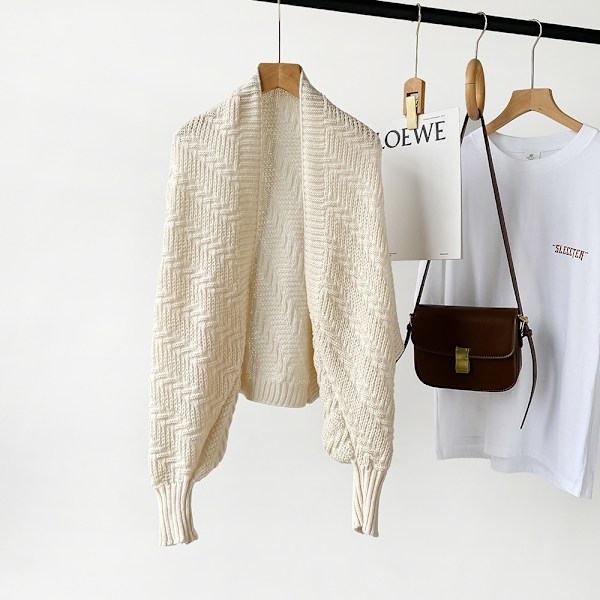 Stickad sjalomslag Beige