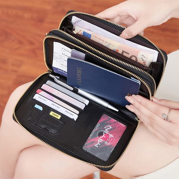 RFID-blockerande reseplånbok, svart läderpasshållare med handledsrem