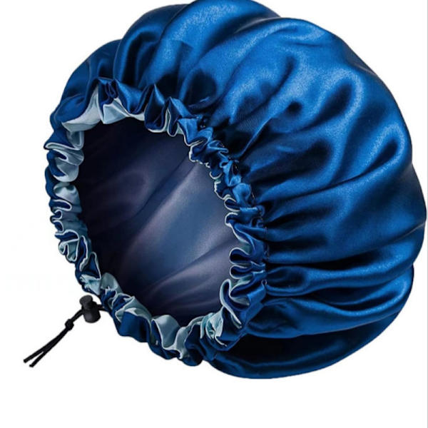 Dubbelsidig satinsovhuva med justerbart elastiskt band NavyBlue NavyBlue