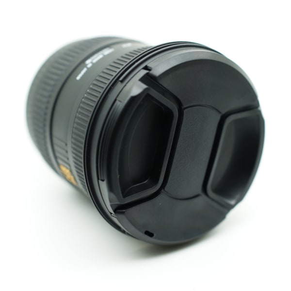 Universellt linsskydd med rem för Canon Nikon Sony Pentax SLR-kameror 62 mm