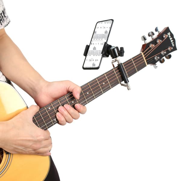 D-Style Capo gitarrklämma med telefonhållare — stål, roterbar och tiltbar för akustisk och elektrisk gitarr, svart