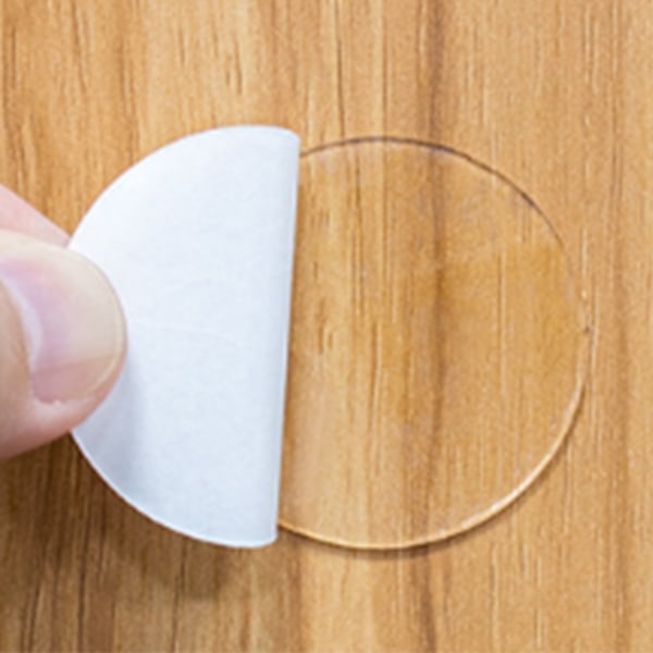 Runde dobbeltsidede klistermærker lavet af nanotape Gennemsigtig