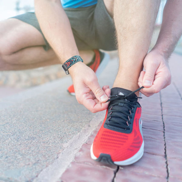 Fitbit Charge 5 armband med flätad mönster Blå/Orange