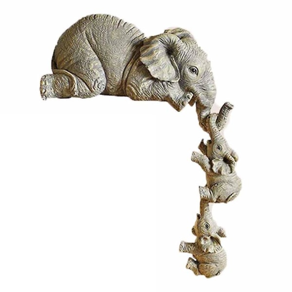 Elefanttiäiti ripustaa kahta baby hyllyn tai pöydän reunassa