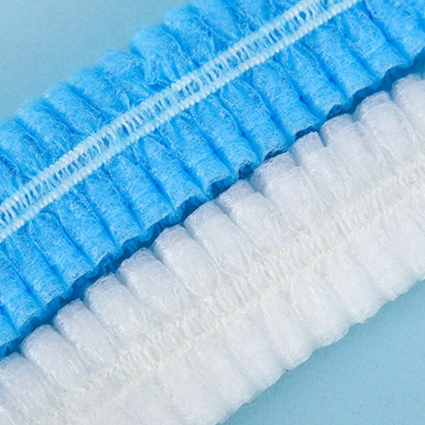 100 stk engangshette høy elastisitet u-vevd stoff engangshårnett hodebeskyttelse for skjønnhetssalong Factory Blue 21in dobbelt gummibånd