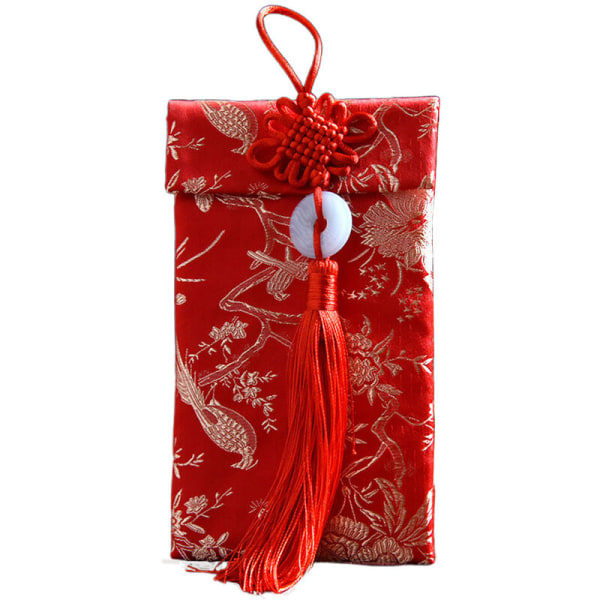 Den røde bryllupskonvolut er en god gave. Det er en gave af kreative brokade stoffer, 10.000 renminbi røde konvolutter, bryllup forsyninger. lodret jadehale