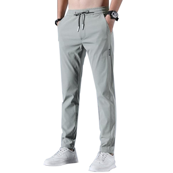 Snabbtorkande stretchiga herrjoggingbyxor med dragsko i midjan och fickor, 4XL gröna