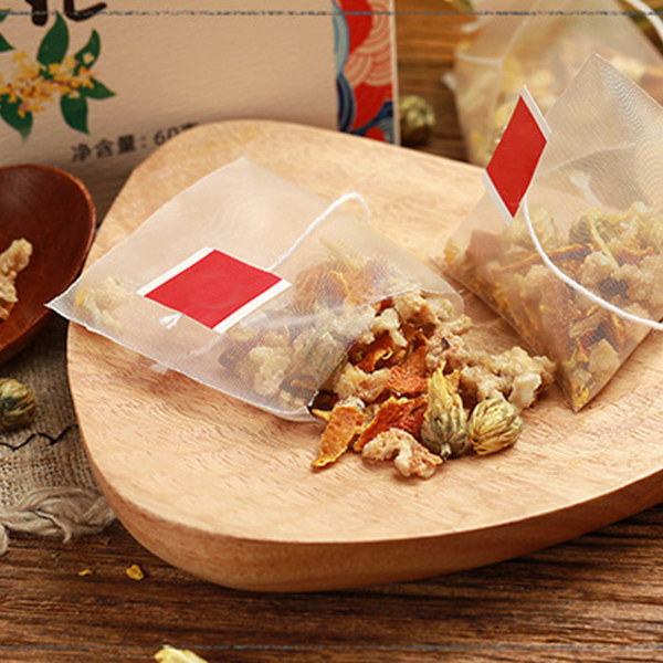 15 förpackningar Osmanthus tepulver malningsprocess Osmanthus päron örtte Triangulärt förpackning te för hemmakontor