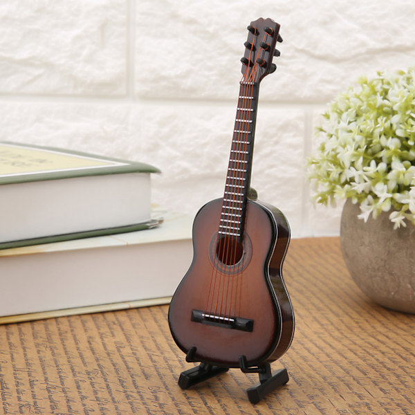 Mini træguitar model display Mini musikalske pynt Håndværk hjemindretning (brun 14cm)