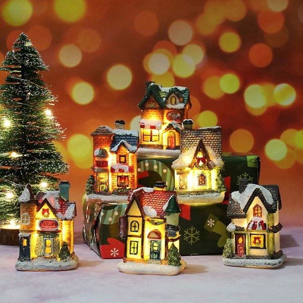 Hartsi joulukohtaus Kylätalot Kaupunki lämpimällä keltaisella led-valolla, toimii joulukoristeella