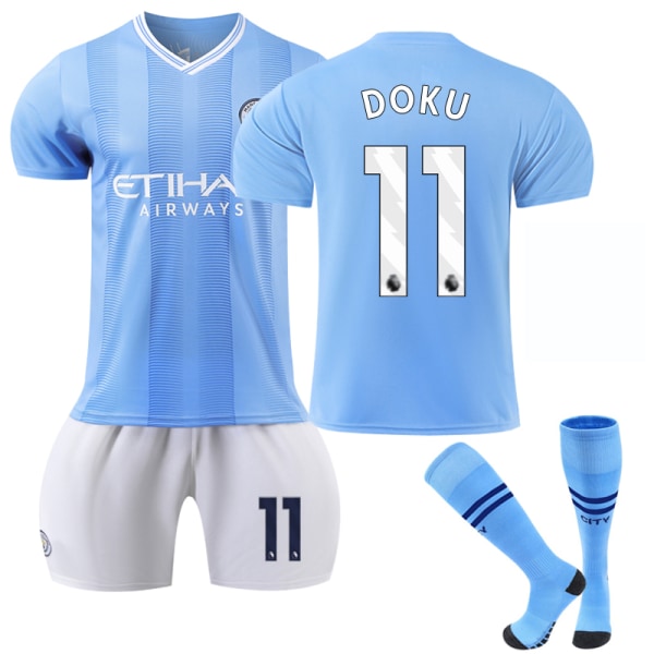 Erinomainen laatu-23-24 Manchester City Home Kids Football Kit nro 11 Doku 18
