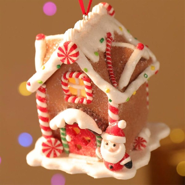 Julscen byhus, led upplysta julbyggnader, julglödande litet hus